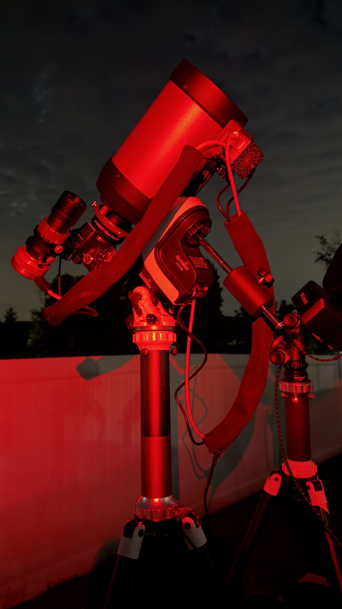 C50 rig with a Celestron C5 optical tube and Nikon DSLR mounted on a NexStar mount under red field light.